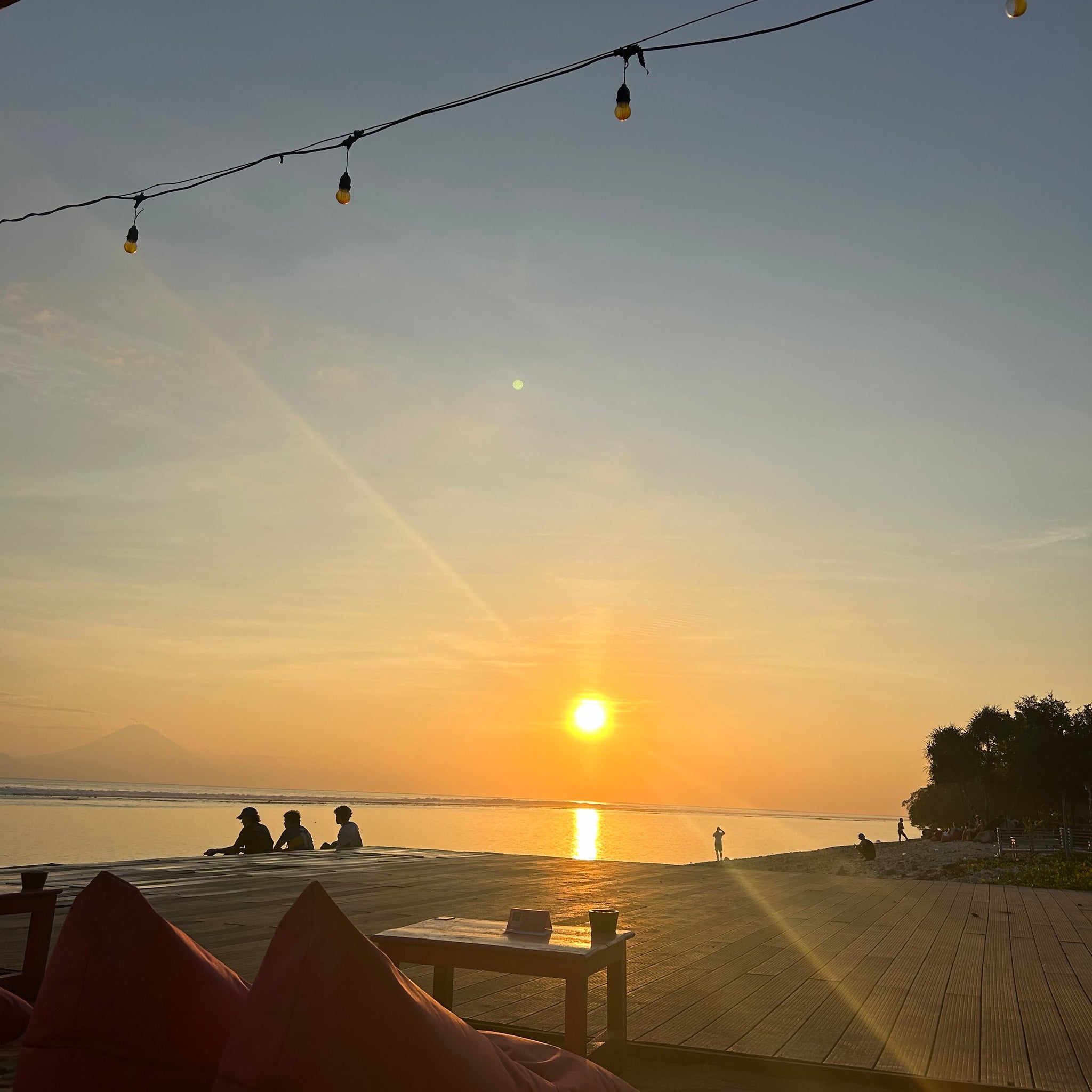 Unwinding in Bali: Stunning Sunsets, Music, and Ice-Cold Beers.